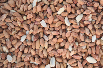 Raw peeled peanuts background or texture.