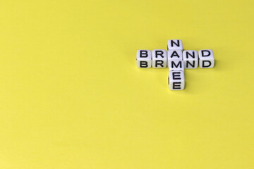 NAME BRAND word written on wood block. NAME BRAND text on wooden table for your desing, concept.