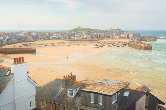 Scenic harbour view from the Malakoff of the quaint and charming seaside Cornish port town of St Ives at low tide on the Atlantic coast of Cornwall, England, UK.