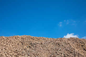 blue sky and tck stones