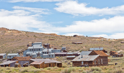 Stamping mill and abandoned buildings in the gold mining ghost town of Bodie, CA, U.SA.A. - 443706231