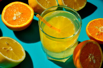 Orange and lemon juice in a glass.
