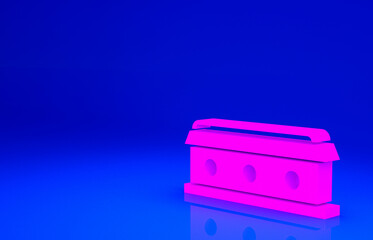 Pink Coffin with christian cross icon isolated on blue background. Happy Halloween party. Minimalism concept. 3d illustration 3D render