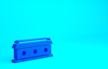 Obraz premium Blue Coffin with christian cross icon isolated on blue background. Happy Halloween party. Minimalism concept. 3d illustration 3D render