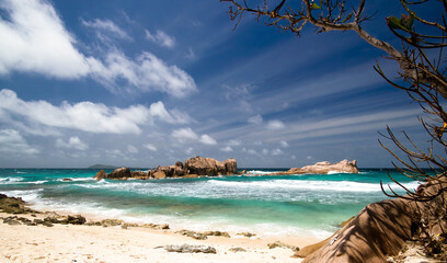 White beach, turquoise Indian Ocean, in La Digue, Seychelles islands