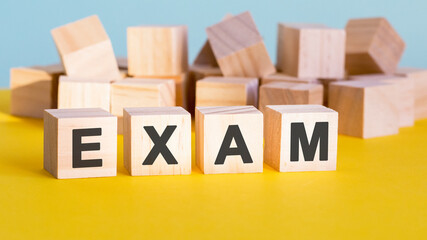 exam word construction with letter blocks and a shallow depth of field