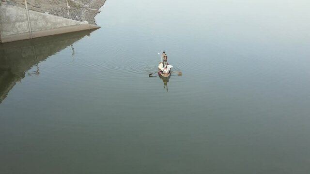 Fishing Boat with Large Catch Fish Swirling Flock Gulls Aerial View