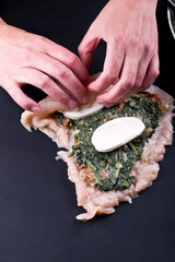 preparation of chicken roulade with spinach and mozzarella