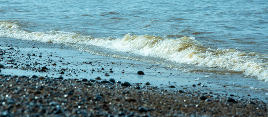 Close up of sea waves and shore