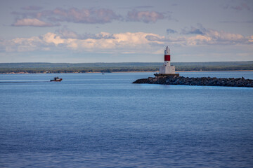 Presque Isle Harbor Lighthouse at the end of  the breakwater at Lake Superior, Michigan, USA