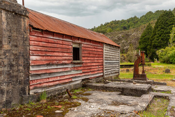 Old mining factory in the ghost town of Waiuta, New Zealand