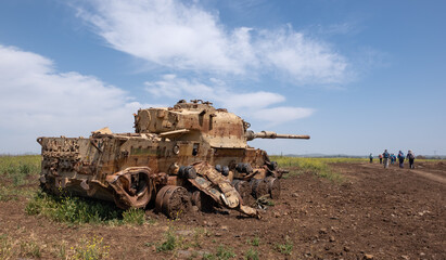 A World War II tank left on the battlefield, Golan Heights, Israel. Old rusty tank in peacetime. No...