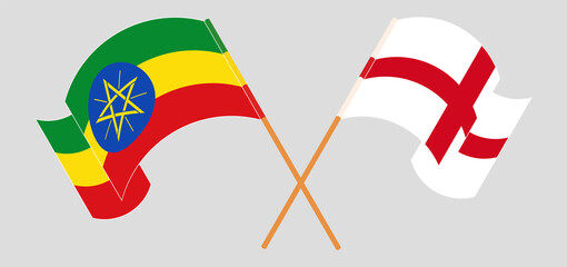 Crossed and waving flags of Ethiopia and England