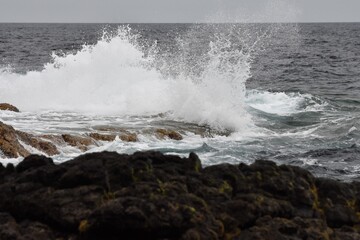 the waves showing their power