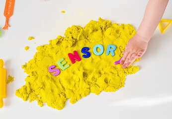 Sensory word and magic kinetic sand. Early sensory education. Kidd's sensory experiences, games and...