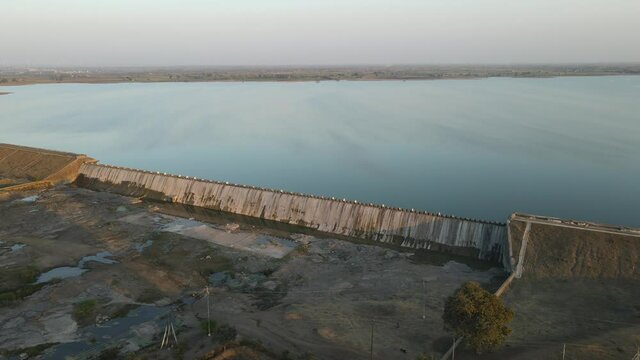 dam water aerial view taken from 300 meters above the surface. Amazing Aerial sunset view of Dam. 4k resolution.