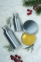 cosmetic products mockup on artificial snow. background for presentation of cosmetics for new year or christmas gift