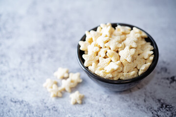 Dried wheat stars for breakfast in a bowl
