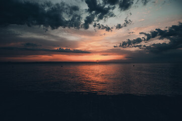 Beautiful sunrise by the sea on a warm summer day.