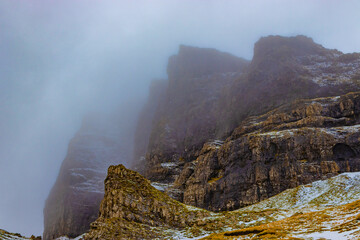 Isle of Skye, Scotland, UK, Old Man of Storr, at Sunrise Sunset, Ancient Natural Stone Monument with a touch of winter snow