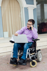 man disabled with wheelchair work business online