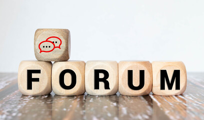 FORUM word made of wooden letters, concept