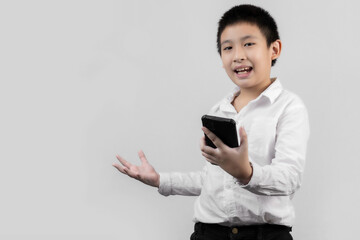 Asian boys studio portrait on gray background