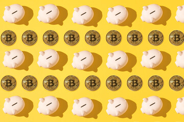 Little pink ceramic piggy bank pattern and bitcoin pattern on yellow background. Concept of cryptocurrency, saving money and savings.