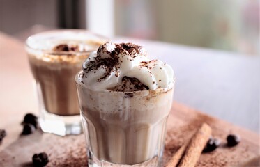 closeup coffee with chocolate coffee beans and cinnamon drink