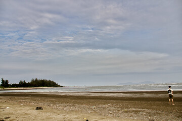 Wooden sea house sinking into ocean