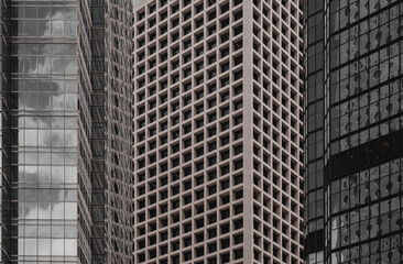 Modern Hong Kong Architecture; Hong Kong Business Building Close up; black and gold color tone