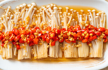 steamed golden needle mushroom or enokitake with soy sauce, chilli and garlic