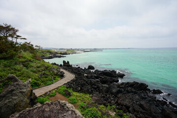 a beautiful seaside landscape with a walkway