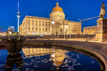 The reconstructed Berlin City Palace and the famous TV Tower at night