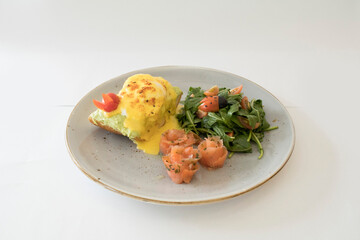 western luxury breakfast with avocado toast, boiled egg, smoked salmon fish, fried potato cake and salad halal breakfast menu 
