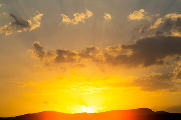 sunset over the mountains. Sunset. Background. Light. Photo. 