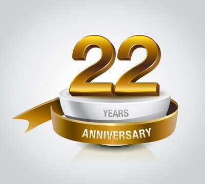 22 years golden anniversary logo celebration with ring and ribbon.