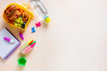 Items for the school and lunch box with sandwiches