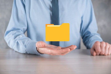 Businessman hold folder icon.Document Management System or DMS setup by IT consultant with modern...