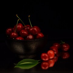 Sweet cherries on black background, low key cherries, 