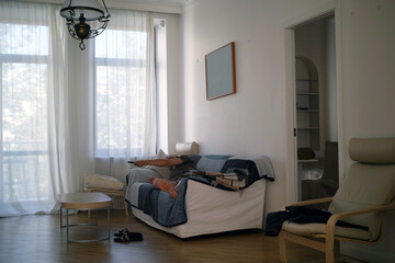 lazy man on sofa