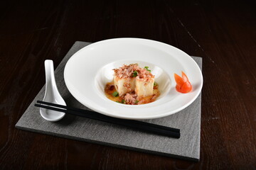 steamed fresh tofu bean curd with Japanese bonito and soy sauce asian in dark background halal menu