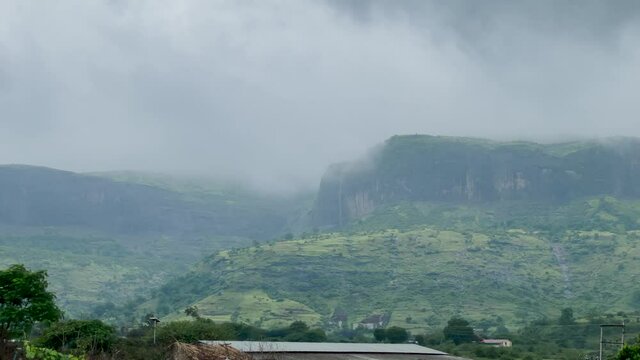 Fog Covered The Mountain Range Of Brahmagiri In The Western Ghats In India. wide shot