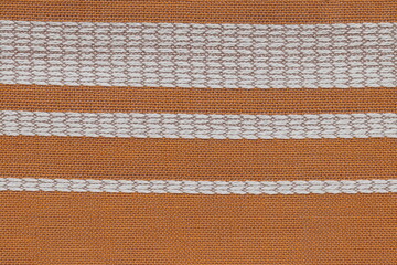 The texture of the fabric made of cotton with a pattern. 