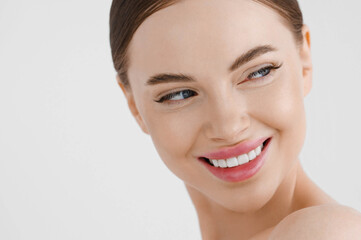 Obraz premium Beautiful woman face healthy skin natural make up lips close up blue eyes