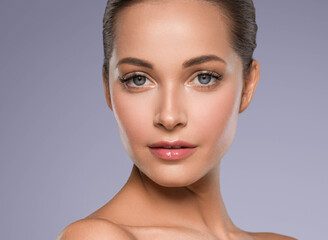 Beautiful woman face healthy skin care natural beauty close up 