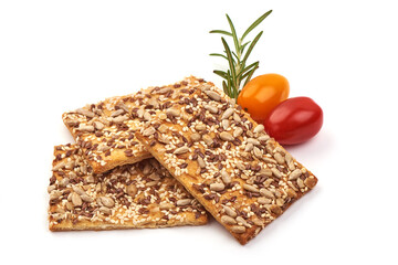 Wholegrain crispy bread with sunflower, linen and sesames seeds, isolated on white background. High resolution image.