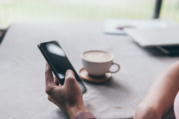 Coffee cup and Mobile phone