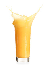 Glass of fresh orange juice with splash on white background