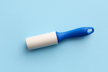 Lint roller on color background